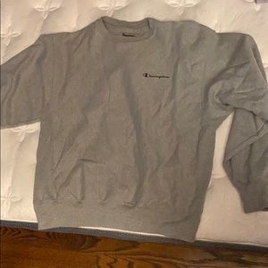Gray champion sweatshirt with out the hood.